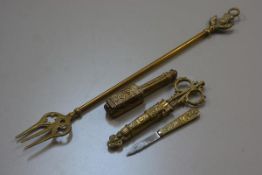 A collection of brass including a pair of scissors and knife complete with sheath, a pair of