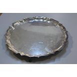 An Epns George III style scalloped serving tray, retailed by AJ Smith of Aberdeen (d.36cm)