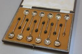 A set of twelve silver bean handled coffee spoons (one bean terminal missing), Sheffield 1945 (96g)