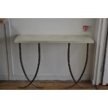 A modern painted top console table, raised on twin anodised metal tapered cross supports (h.98cm x