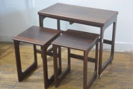 An AH Mackintosh of Kirkcaldy, Fife, rosewood nest of three tables, the larger with swivel