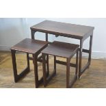 An AH Mackintosh of Kirkcaldy, Fife, rosewood nest of three tables, the larger with swivel