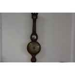 A George III faux rosewood and painted banjo style barometer with broken swan neck pediment with dry