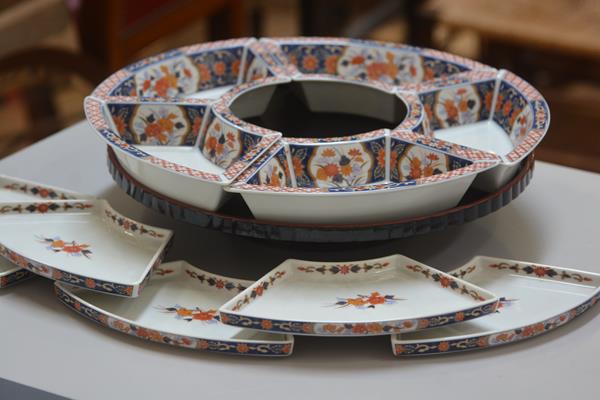 A Japanese lacquered presentation serving dish complete with lacquered stand and set of Imari