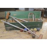 A green painted Jacques style pine croquet box with rope handles to side containing an assortment of