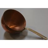 A copper brass handled chocolate melting pan (d. 30cm h.14cm)
