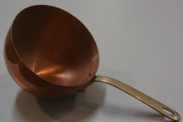 A copper brass handled chocolate melting pan (d. 30cm h.14cm)