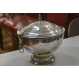 An Epns soup tureen in the Regency style with acorn finial and lion ring mask handles to side (h.