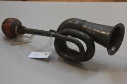 A brass plated car horn with original rubber ball (l.40cm. horn mouth d.10cm)