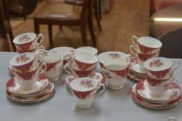 A thirty three piece Paragon china Rockingham pattern tea service including two sugar bowls and