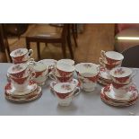 A thirty three piece Paragon china Rockingham pattern tea service including two sugar bowls and