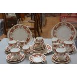 A Queen Anne Regency pattern forty piece tea and coffee service complete with three cake plates,