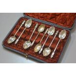 A box containing two Sheffield silver shell bowl apostle spoons, Sheffield 1896 and five various