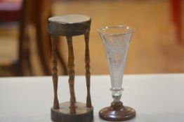 A 19thc engraved tapered flower tube, raised on circular ash base with pineapple, grape and pheasant