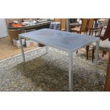 A tubular aluminium frame satin finish rectangular reversible glass topped kitchen/dining table or