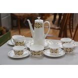 A Royal Tuscan china Arabesque pattern part coffee set, complete with coffee pot, decorated with