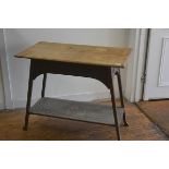 An Edwardian oak Arts & Crafts style occasional table, the rectangular top with moulded edge and