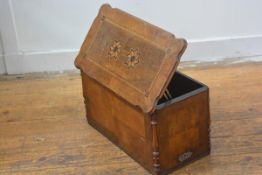 A late 19thc walnut inlaid sewing machine box with diamond inlaid border panel to top, enclosing a