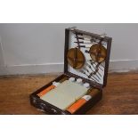 A Sirram picnic basket complete with original plates, storage boxes, twin flasks, flatware etc. (