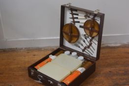 A Sirram picnic basket complete with original plates, storage boxes, twin flasks, flatware etc. (