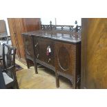 A late 19thc Chippendale design ledgeback sideboard with pierced gallery back, mounted with