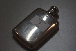 A Chester silver hip flask with screw down top, with engraved inscription, J.A. Briggs, Dundee,