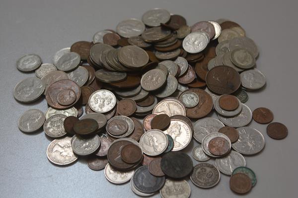 A collection of miscellaneous Continental and British coins including silver sixpences, thruppeny