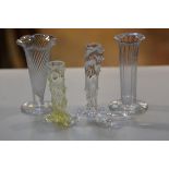 Two 19thc spiral fluted and fluted crystal bud vases, a vaseline glass knob stem bud vase and a