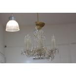 A modern crystal eight branch pendant light fitting mounted with crystal drops(one branch a/f) (h.