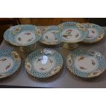 A Minton twelve piece dessert service with pierced basket enamelled border and floral and gilt