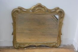 A 19thc giltwood rococco style carved frame with C scroll surmount and corners (67cm x 72cm)