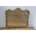A 19thc giltwood rococco style carved frame with C scroll surmount and corners (67cm x 72cm)