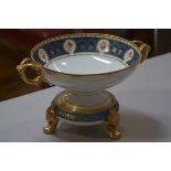 A Noritake porcelain fruit bowl on stand decorated in the French taste with blue and gilt and floral