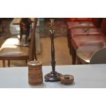 A treen carved tobacco jar and cover, a treen carved ashtray and an Edwardian mahogany turned