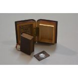 A miniature mauchline tartanware book with Burns family registering the poet's handwriting, cased