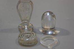 A 19thc Nailsea glass paperweight, a crystal spiral lobed napkin ring, a crystal floral decorated