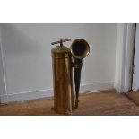 A brass marine foghorn, the domed cylindrical case with t-bar handle and side-mounted horn. 80cm