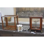A vintage mahogany cased balance scale, bearing maker's label "Baird & Tatlock, Glasgow" (