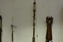 A Portuguese brass gimballed ship's stick barometer, c. 1900, the gauge signed JJBLH Desterro,