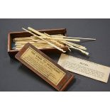 An Edwardian mahogany cased set of ivory Spellicans. 12cm