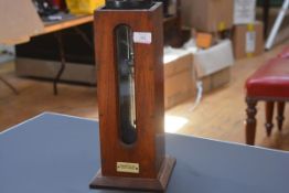 An early 20th century mahogany cased calorimeter, bearing ivorine maker's label for Cambridge & Paul