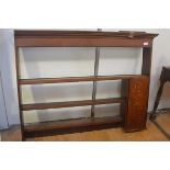 A George III oak dresser rack, with moulded cornice, fitted to one side with a cupobard door