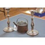 A pair of Victorian silver-plate on copper candlesticks; together with a small copper kettle.