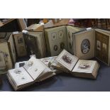 A group of eight Victorian leather-bound photograph albums, each with portrait photographs.