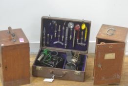 A box containing two microscope cases and a Frequenta by Velmag of Leipzig electro therapy