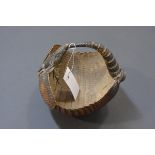Taxidermy: a 19th century small basket formed from an armadillo. Width 18cm