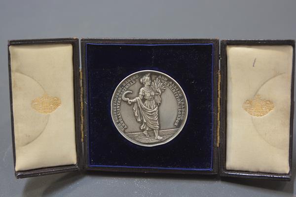 An Edwardian silver exhibition medal, The Confectioners, Bakers and Allied Trades International