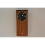 A vintage Telesect wall-mounted electric clock. 60cm