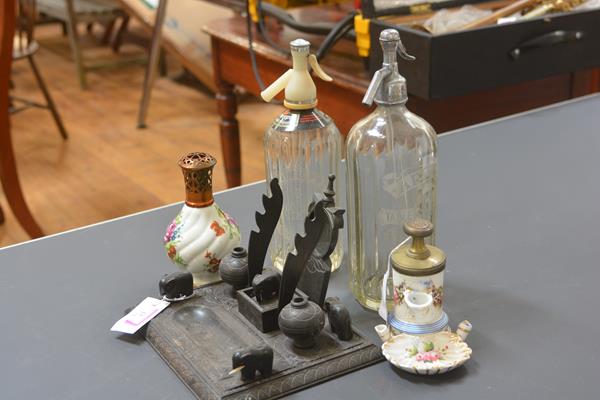 A group comprising: a Lampe Berger porcelain bottle; a 19th century French syphon inkwell with