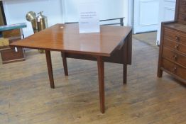 A 19th century mahogany dropleaf dining table, the rectangular top raised on rectangular-section